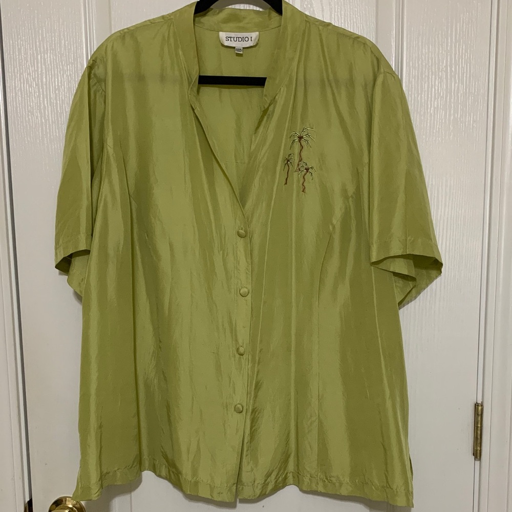 Beautiful light blouse with short sleeves.